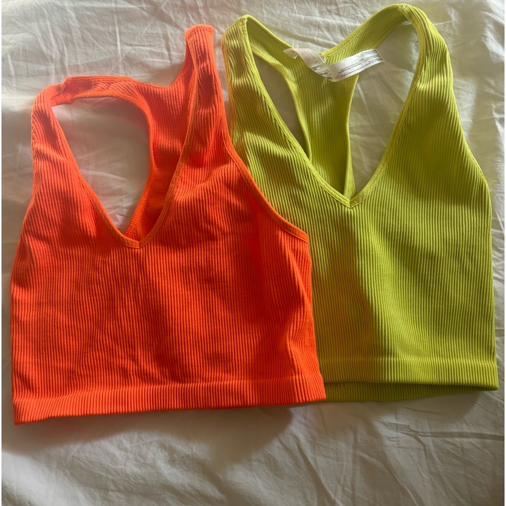 orange and yellow free people ribbed tank tops